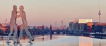 Molecule Man sculpture on the Spree River in Berlin