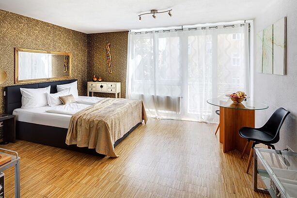 A modern furnished room in a Sunnyside Apartment.