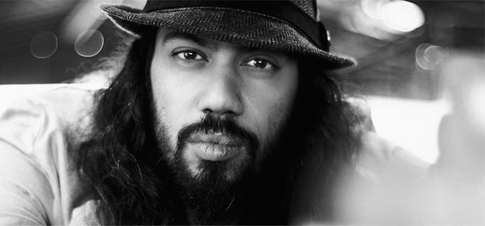 Samy Deluxe Gesicht des Künstlers mit Hut