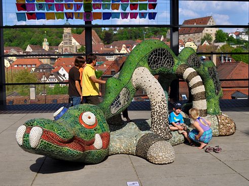 Modern art against backdrop of old town center