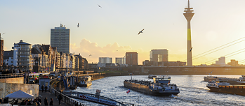 View of the Rhine Tower in Düsseldorf at sunset.