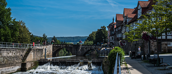 View of the River Leine in Göttingen. Half-timbered houses, a historic bridge.